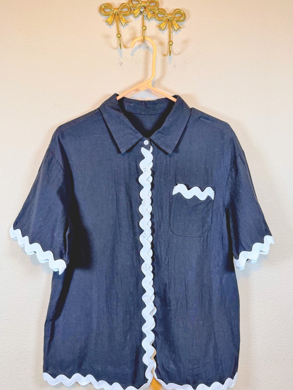 Women’s Black Short-Sleeve Blouse with White Rickrack Trim. Size M
